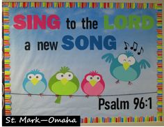 a bulletin board with three birds on a line and the words sing to the lord, a new song