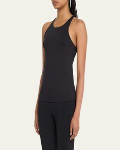 Alo Yoga "Select" active tank in solid stretch knit. Halter neckline. Sleeveless. Racerback. Fitted. Pullover style. Polyester/spandex. Imported. Athleisure Top With Built-in Bra And Halter Neck, Athleisure T-back Top For Training, Racerback Tank Top With Built-in Bra And 4-way Stretch, Sports Tops With Built-in Bra And Minimal Stretch, High Stretch Mesh Back Tank Top In Athleisure Style, High Stretch Racerback Tank Top For Training, Seamless T-back Tank Top For Workout, Stretch Moisture-wicking Racerback Top, Stretch T-back Tops For Workout