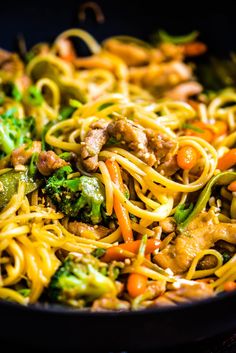 noodles with meat and vegetables in a skillet