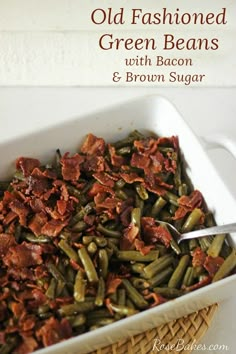 old fashioned green beans with bacon and brown sugar in a white casserole dish