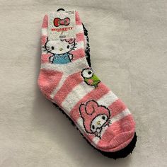 Hello Kitty & Friends Crew Fuzzy Socks 2 Pairs Size: 4-10 Cute Super Soft Socks For Indoor, Cute Super Soft Indoor Socks, Cute Winter Non-slip Socks, Cute Pink Winter Socks, Cute Black Non-slip Socks, Cute Soft Pink Socks, Cute Cat Design Socks For Winter, Fun Pink Socks For Stocking Stuffers, Cute Winter Socks With Cat Design