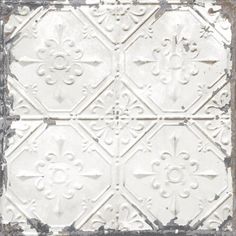 an old tin ceiling tile in white