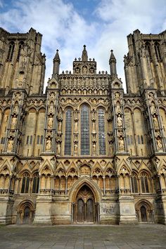 the large building has many windows on it's sides and is very ornately decorated