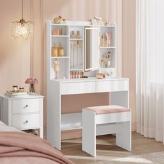 a white dressing table with drawers and stools next to a pink curtained window