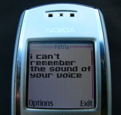 an old cell phone with the message petria on it's screen, but this phone has been longer than your love did