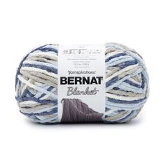 bernat blanket yarn ball in blue and white colors on a white background with the label