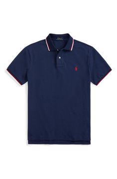 Iconic branding stamps a classic polo shirt shaped from pure cotton. 28 1/2" length (size Medium) Button half-placket Spread collar Short sleeves Straight hem 100% cotton Machine wash, tumble dry Imported Men's Clothing Mens Polo Shirt, Ralph Lauren Polo Shirt, Shirt Men, Ralph Lauren Polo, Navy Classic Relaxed Fit Polo Shirt, Navy Cotton Polo Shirt, Classic Collared Ralph Lauren T-shirt, Navy Polo Shirt, Polo Shirt Style