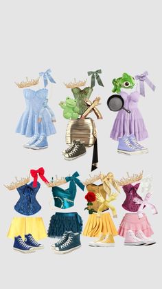 an assortment of clothes and shoes for dolls