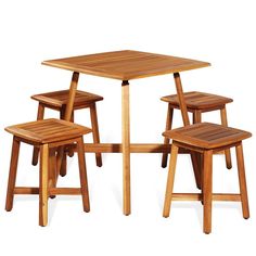 a wooden table with four stools around it and one on the floor next to it