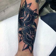 a person with a tattoo on their arm