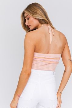 Radiate sunshine, summer and sweetness in this halter crop top! The perfect top for a concert, sunset dinner or a summer date night with your crush! We'd wear this beauty with denim shorts or white pants to complete the look. Add your favorite sandals or heels to be event-ready. Halter Neckline Ribbed Cropped Adjustable Tie Model is 5'9 and wearing a size S. Recommended Sizing. 2-4 S, 6 M, 8-10 L. Types Of Shorts, Athleisure Tops, Workout Crop Top, Sweater Crop, Stylish Sweaters, Halter Crop Top, Crop Top Sweater, Sweater Material, Knit Crop Top