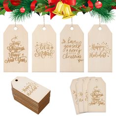 wooden tags with christmas sayings hanging from the top and below them, surrounded by holly branches