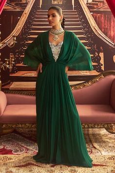 Emerald green draped dress with cutdana, bead, gota, sequin embellishment on yoke in floral pattern. - Aza Fashions Indian Plus Size, Dress Georgette, Green Drapes, Indo Western Dress, Beautiful Silhouette, Vacuum Storage, Western Dress, Ready To Wear Saree, Indian Wedding Wear