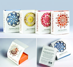 four different types of business cards with designs on the front and back, in various colors