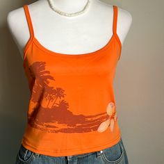 New Without Tags - Cropped Summer Tropical Beaches And Floral Graphic Tank Top Measurements Approximately: Tag Size Small Pit To Pit 16” Shoulder Strap To Hem 17” Bundle All Your Likes For Greater Discounts. Happy To Consider Your Offer Or Counteroffer. Closet Clear Out Days Are A Great Time To Cash In On Discounted Shipping For Your Purchase! Due To Lighting Item’s Color May Vary Slightly From Pictures. Thanks For Checking Out My Listing. Thrifted Tank Tops, Cute Halter Tops, Cute Summer Tank Tops, Dream Clothes T-shirts & Tank Tops, Graphic Tank Tops Aesthetic, Orange Summer Outfits, Tropical Streetwear, 2000s Summer Fashion, Cool Tank Tops