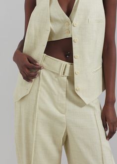 Color: Limoncello Lightweight woven fabric Regular fit Tapered leg Fitted waist Side seam pockets Back illusion welt pockets Detachable belt Belt loops Zip fly Hook and bar closure Unlined 86% Viscose 14% Linen Dry Clean By 3.1 Phillip Lim. Imported Luxury Belted Workwear Bottoms, Fitted Office Bottoms With Belt, Luxury Beige Bottoms For Workwear, Classic Fitted Bottoms With Belt Detail, Classic Tailored Belted Bottoms, Fitted Straight Leg Bottoms With Belt, Fitted Beige Belted Pants, Summer Workwear Pants With Belt Detail, Beige Belted Bottoms For Work