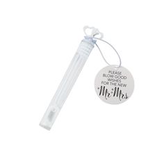 a white plastic pen with a tag that says please blow good for the new mrs