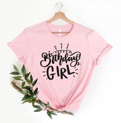 🎈 Happy birthday! Show up to your next birthday party in style with this eye-catching pink t-shirt that declares "Birthday Girl" for the lady of the hour! Or, a perfect gift for a friend for a night out on the town. This just might be the softest and most comfortable women's t-shirt you'll ever own. Combine the relaxed fit and smooth fabric of this tee with jeans to create an effortless every-day outfit with our birthday shirts, or dress it up with a jacket and dress pants for a business casual Pink Crew Neck Top For Birthday, Pink Letter Print Top For Party, Pink T-shirt For Birthday, Pink Birthday T-shirt With Name Print, Pink Graphic Print Top For Birthday, Pink T-shirt With Name Print For Birthday, Pink Letter Print Top For Birthday, Pink Summer Tops For Birthday, Pink Text Print T-shirt For Birthday