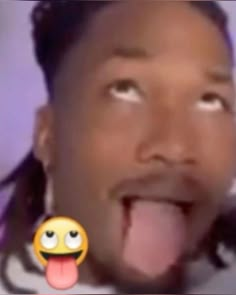 a man sticking out his tongue with an emoticive expression