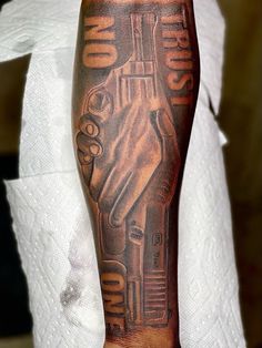 a person with a tattoo on their arm