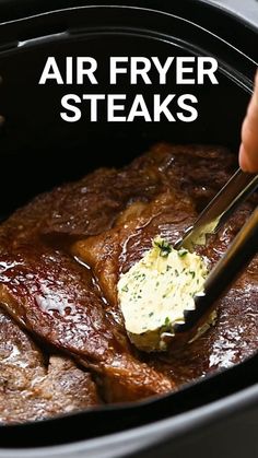 a person is spooning some food out of an air fryer slow cooker