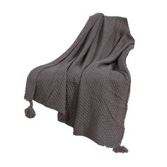 a gray blanket sitting on top of a chair