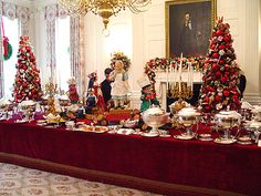 a table covered with christmas decorations and other items