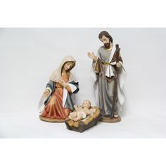 two figurines of jesus, mary and baby jesus