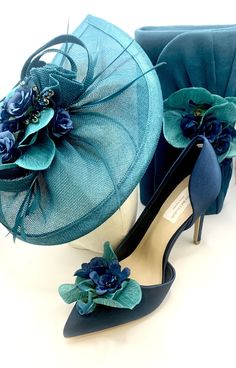 Stunning Orchid and Gemstone Lake Blue Peacock Turquoise Teal Green Bridal Wedding Shoes in a Soft Satin Finish Beautiful lake blue peacock turquoise teal green gemstones with rose petals and orchids Very Elegant Perfect Wedding Day Shoe High for Elegance Sizes: UK 3-7 (EU 36-40) Co-ordinates with our - Stunning Turquoise Teal Lake Blue Peacock Orchid Mixed Flower Embellished Bridal Wedding Clutch Bag with Gold Chain and Stunning Lake Blue Peacock Turquoise Teal Green Wedding Fascinator Hat Elegant Turquoise Heels For Party, Elegant Turquoise Party Heels, Elegant Blue Heels For Wedding Guest, Fitted Blue Wedding Shoes, Peacock Orchid, Teal Green Wedding, Wedding Clutch Bag, Wildflower Wedding Theme, Fascinator Hats Wedding