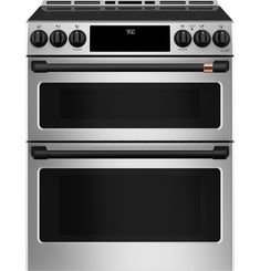 two stainless steel ovens side by side with the top open and bottom closed, on a white background