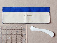 sewing supplies are laid out on the table to be sewn and stitched together