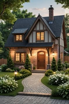 a house that is surrounded by flowers and trees