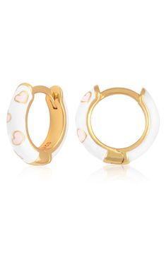 Easy-to-wear hoop earrings will add significant polish to even your most casual ensembles. 1/2" drop; 1/8" width Hinge with snap-post closure Sterling silver with goldtone plate/enamel Imported Enamel Huggie Jewelry Gift, Enamel Huggie Earrings Perfect For Gifts, Trendy Enamel Hoop Jewelry, Trendy Enamel Huggie Earrings, Trendy Small Hoop Earrings For Valentine's Day, Trendy White Huggie Earrings For Everyday, Everyday Trendy White Huggie Earrings, Nickel-free White Huggie Earrings, White Enamel Hoop Earrings For Gifts