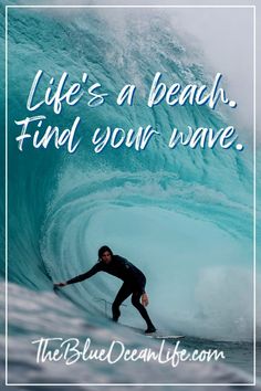 a man riding a wave on top of a surfboard in front of a blue ocean