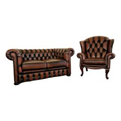 two brown leather couches and one chair with buttons on the armrests are facing each other