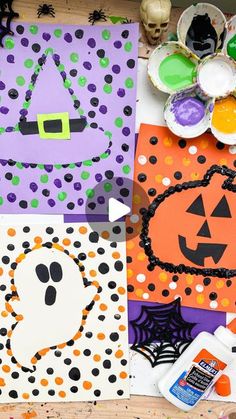 halloween crafts and supplies are laid out on the table for kids to make their own decorations