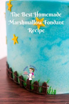 the best homemade marshmallow - fondant recipe is on this blue frosted cake