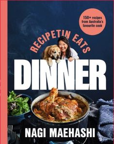 a cookbook cover with a woman and her dog in front of a dinner dish