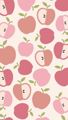 an apple pattern is shown in pink and green colors, with two halves cut out to show the same size