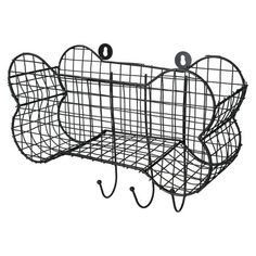 a wire basket with hooks hanging from it