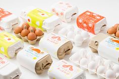 several cartons of eggs are shown on the table