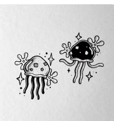 an ink drawing of two jellyfishs with stars and bubbles on the bottom one is black and white