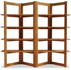 a wooden bookcase with four shelves on each side