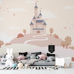 a child's bedroom decorated in pink and grey with a castle mural on the wall