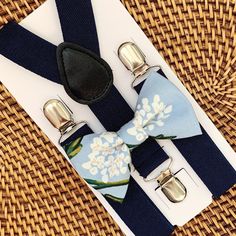 "Your special guy will look so handsome when he shows up wearing this Dusty Blue Rifle Paper Co bow tie and Navy Suspenders! This floral bow tie & suspender set is a great choice for family photos, wedding, ring bearer outfit, birthday celebration or any other special occasion. ❤ **Please Specify** Bow Tie Only (w/ Clip or Neck Strap), Suspenders Only, or Bow Tie Only & Susp (Bow Tie and Suspenders) SUSPENDERS- One Pair of our Quality Suspenders BOW TIE - One Bow Tie on White Adjustable Suspenders Ring Bearer, Wedding Suspenders, Tie And Suspenders, Suspenders Wedding, Gentlemen Wear, Outfit Birthday, Bearer Outfit, Bowtie And Suspenders, Ring Bearer Outfit