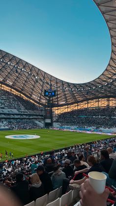 a large stadium filled with lots of people