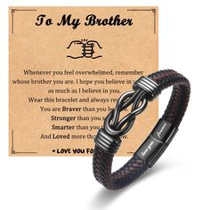 a leather bracelet with an engraved message on it