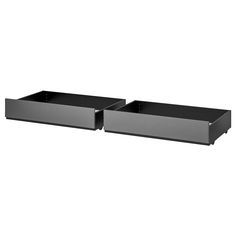 two black trays sitting on top of each other