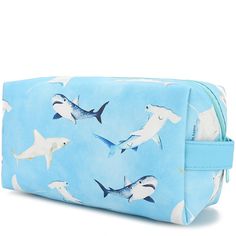 An adorable and square bag to hold all your essentials! Hold makeup, stationery, and more in this pouch and keep your bag organized! The Cosmetic Pouch Happy Sharks Blue is the perfect addition to your bag! Length: 8 inches Width: 4 inches Depth: 3 inches Weight: 0.4 lbs Material: Vegan Leather Large Capacity Rectangular Pencil Case For Daily Use, Blue Rectangular Case Bag For Daily Use, Trendy Blue Rectangular Case Bag, Blue Rectangular Daily Use Bag, Blue Large Capacity Pouch For Daily Use, Blue Spacious Pouch For Daily Use, Rectangular Cosmetic Bag With Pen Holders For Storage, Portable Rectangular Pencil Case, Rectangular Portable Pencil Case