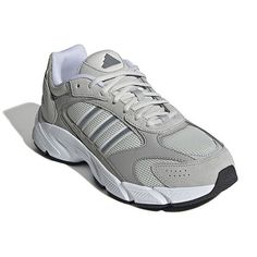 Step into comfort and make a stylish statement with the adidas Crazychaos 2000 shoes. Their breathable mesh upper lets your feet breathe easy while the Cloudfoam midsole cushions each step with pillowy softness. Whether wandering city streets or kicking back at your favourite coffee shop, the versatile design pairs perfectly with everything from joggers to jeans.Closure Type: Lace-UpFootwear Technology: Adidas-CloudfoamUpper/Outer Base Material: 50% Leather, 50% SyntheticShoe Lining Material: Te 2000 Shoes, Cloud Foam, Versatile Shoes, Classic Streetwear, Breathe Easy, Adidas Shop, Kick Backs, The Cloud, City Streets